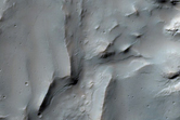 Crater with Layered Deposit in Samara Valles Region
