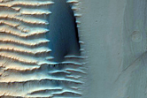 Dark Dunes Superimposed on Light Bedforms in MOC E01-01076
