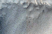 Channel in Northern Mid-Latitude Crater
