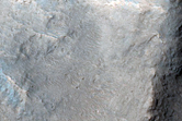 Channel Incising Rim of Fractured Crater
