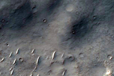 Bakhuysen Crater Ejecta with Mounds and Unit Contacts