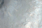 Crater with Rock Outcrop
