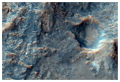 Source Area of Alluvial Fan in Small Crater to the North in Libya Montes

