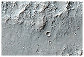 Valleys with Interior Sinuous Ridges in Terrain West of Novara Crater
