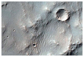 Crater Exposing Bedrock
