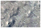 Well-Preserved Impact Crater with Central Pit
