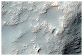 Wrinkle Ridge and Channel Intersection along Huygens Crater Rim
