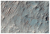 Mesa and Butte-Forming Materials in the Terra Sabaea Region
