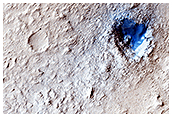 Wind-Streaked Crater in Marte Vallis
