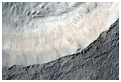 Dipping Layers in Crater Near Reull Vallis