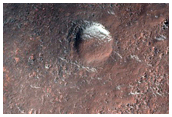 Possible Weathering Sequence in Exposed Sediments Filling Crater