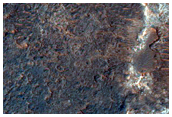 Bright Layered Material Near Oxia Palus Candidate ExoMars Landing Site