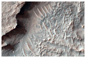 Fan-Shaped Feature in Pit in Crater in CTX Image
