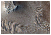 Bright Bedrock and Dark Sediment
