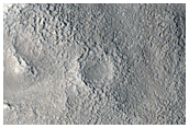 Dipping Layers around Central Mound of Northern Mid-Latitude Crater
