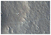 Flows Overlapping Crater Ejecta Blanket in Tharsis Region
