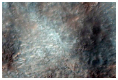 Impact Crater with Central Uplift in Tyrrhena Terra
