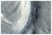 Layers in Small Crater in Northern Mid-Latitudes
