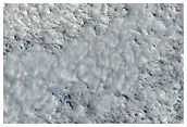 Lyot Crater Ejecta Contacts Seen in Thermophysical Data
