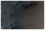 Flow Over Crater Rim in Daedalia Planum
