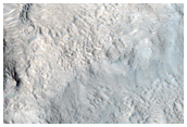 Thin Layers in Eroded Crater Southwest of Bamberg Crater
