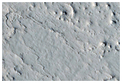 Crater at Edge of Medusae Fossae Formation
