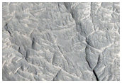 Layers Exposed in Depression in Aeolis Planum
