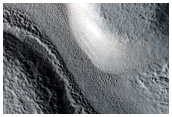 Layered Features in Protonilus Mensae
