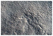 Layered Features Northwest of Galaxias Colles
