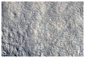 Crater and Mantling Material
