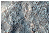Channels in Crater Ejecta in Hellas Planitia
