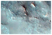 Impact Crater with Central Structure in Syrtis Major
