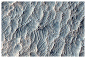 Layered Rocks on Crater Floor
