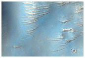 Channels and Layers North of Hellas Planitia
