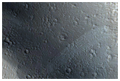 Intra-Block Faulting in Olympus Mons Aureole
