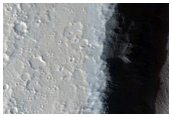Crater in Ceraunius Fossae Region
