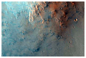 Impact Crater with Pitted Central Peak
