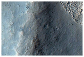 Possible Olivine-Rich Crater Wall in Terra Sirenum
