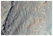 Layers in Irregular-Shaped Depression in Charitum Montes