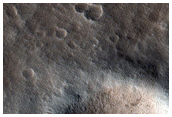 Small Crater at Edge of Olympus Mons Caldera