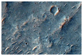 Possible Low Calcium Pyroxene-Rich Crater Ejecta in Hesperia Planum
