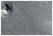 Layers in Depression on Crater Floor in Northern Mid-Latitudes
