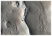 Неравномерные кратеры в ореоле горы Олимп