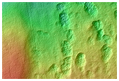 Incipient Scalloped Terrain in Mid-Latitude Mantle at Peneus Patera