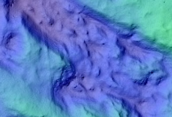 Crater with Lineated Material on Floor