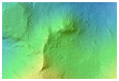 Light-Toned Material along Coprates Chasma Ridge