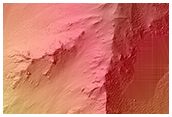 Light-Toned Material along Coprates Chasma Wallrock
