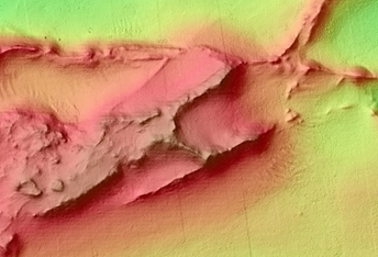 Low Albedo Spot in Northern Nili Fossae Crater