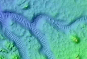 Valleys in Crater North of Sacra Sulci