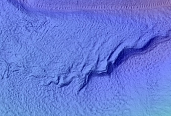 North-Pole-Facing Deposit in Crater Associated with Headwall Erosion